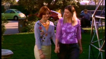 New Moon Rising - Willow and Tara hold hands